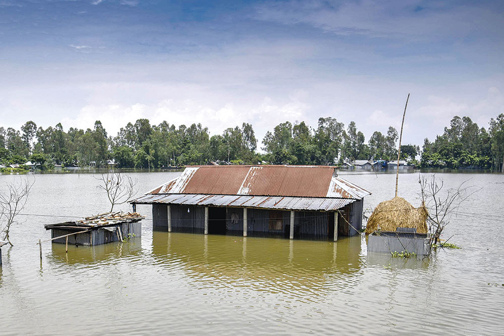 বর্ষণ ও পাহাড়ি ঢলে প্লাবিত নিম্নাঞ্চল