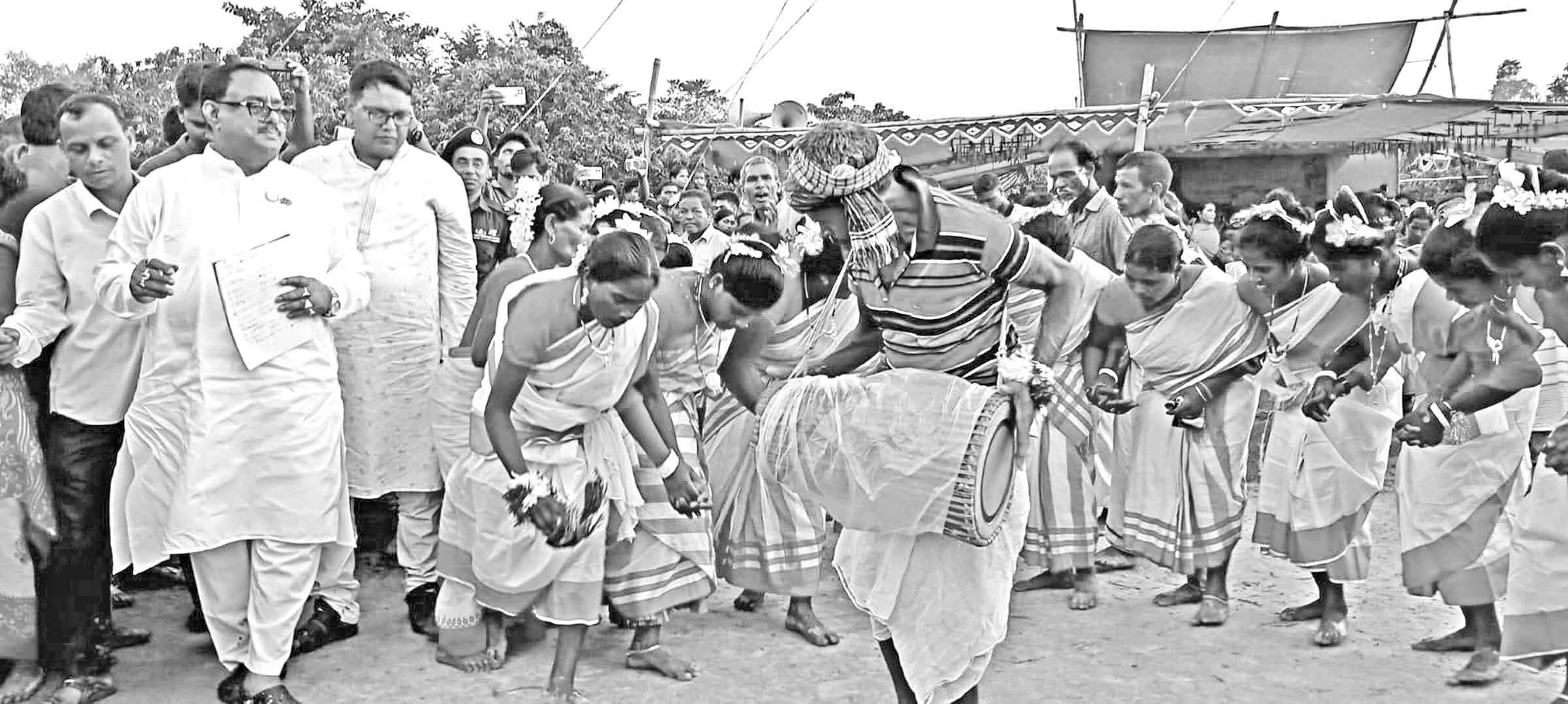 কারাম আদিবাসীদের প্রাণের উৎসব :পোরশায় খাদ্যমন্ত্রী